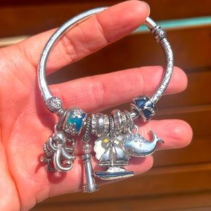 Beautiful silver bracelet with beachy charms.